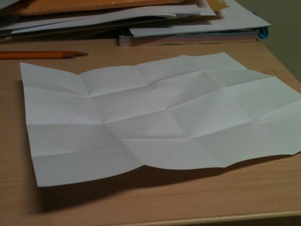 Paper folded into sixteenths
