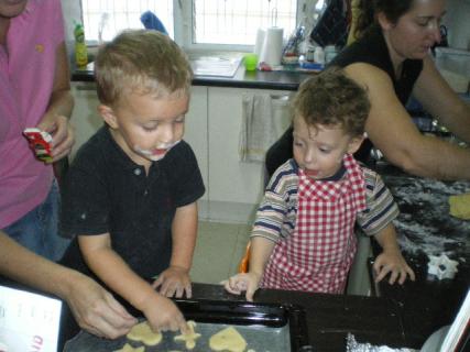 Thanasi and a friend cooking