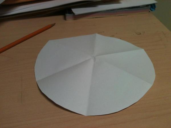 Paper folded into circular sixths