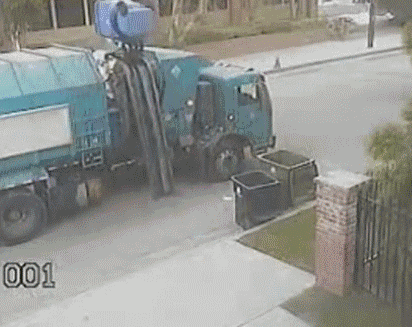 A short clip of a garbage truck attempting to load some garbage using an automated system, which backfires and dumps the garbage all over the ground instead.